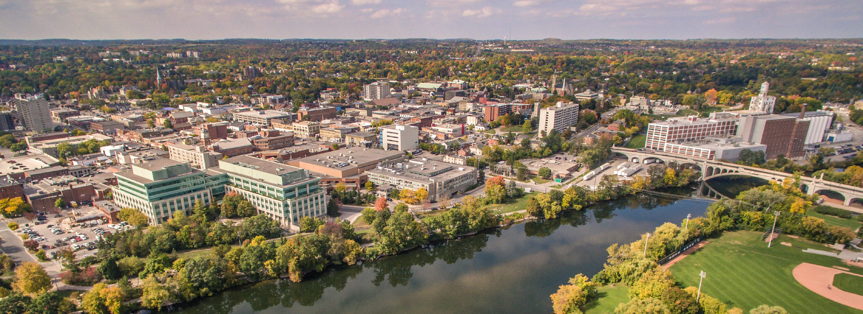 aerial view of a river stream running by downtown Peterborough
