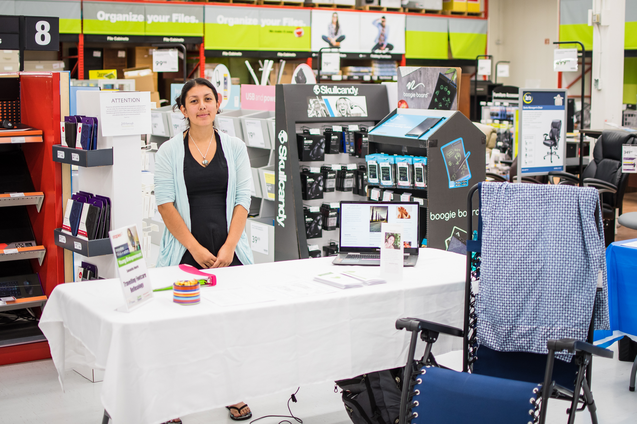 Women behind her booth at Staples Day