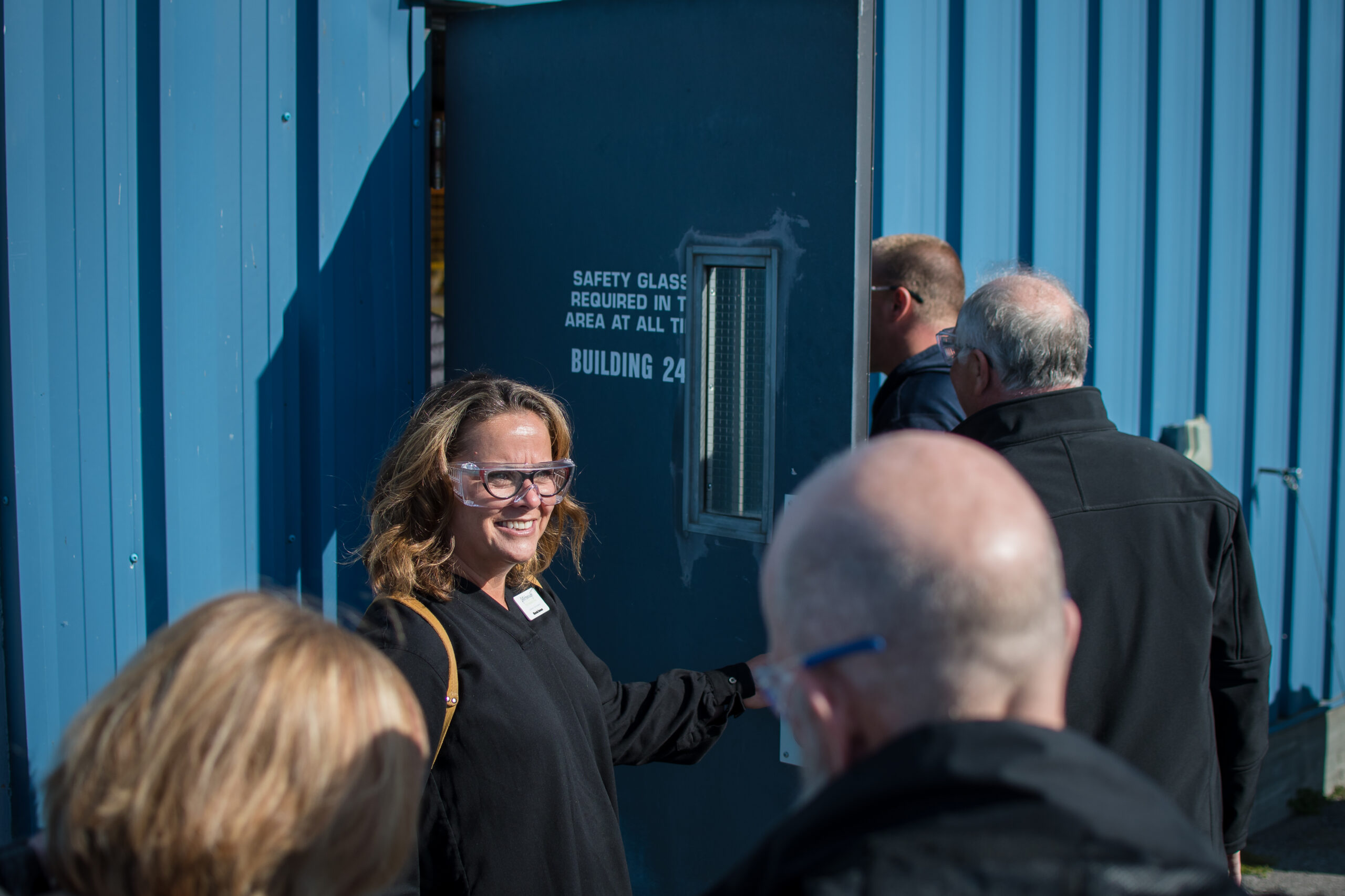 Woman welcoming people at Manufacturing Doors Open 2019
