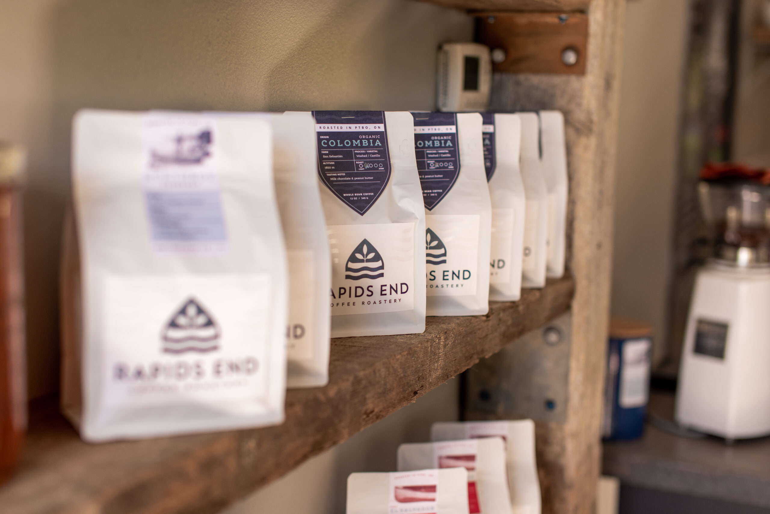 Rapids End coffee packets arranged on a shelf