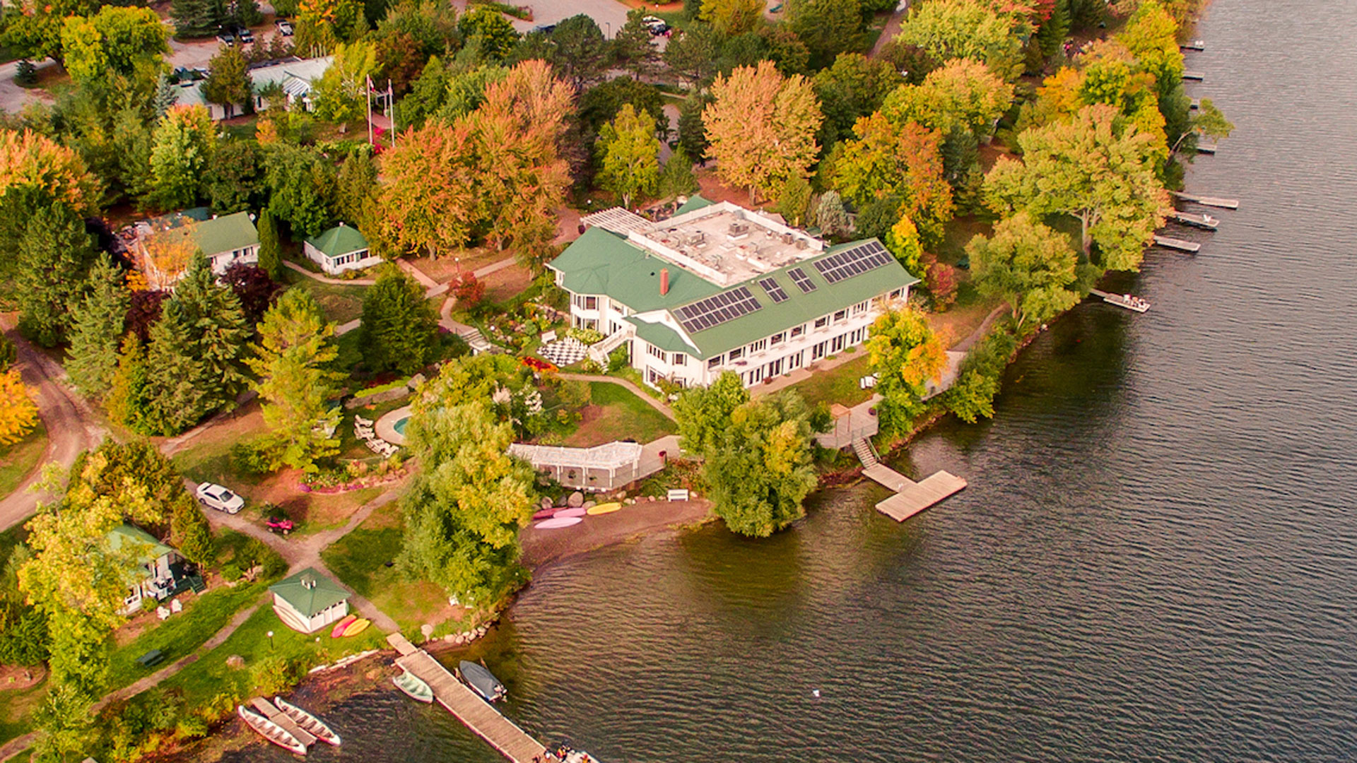 aerial view of lakeshore area during fall