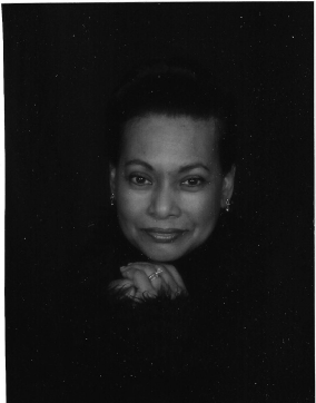 black and white headshot of a woman