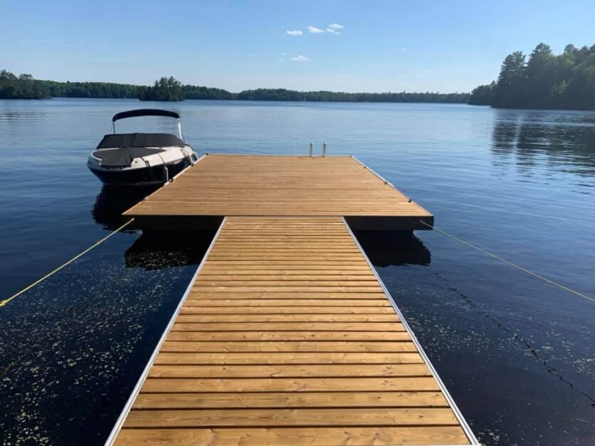boat and deck on a lake