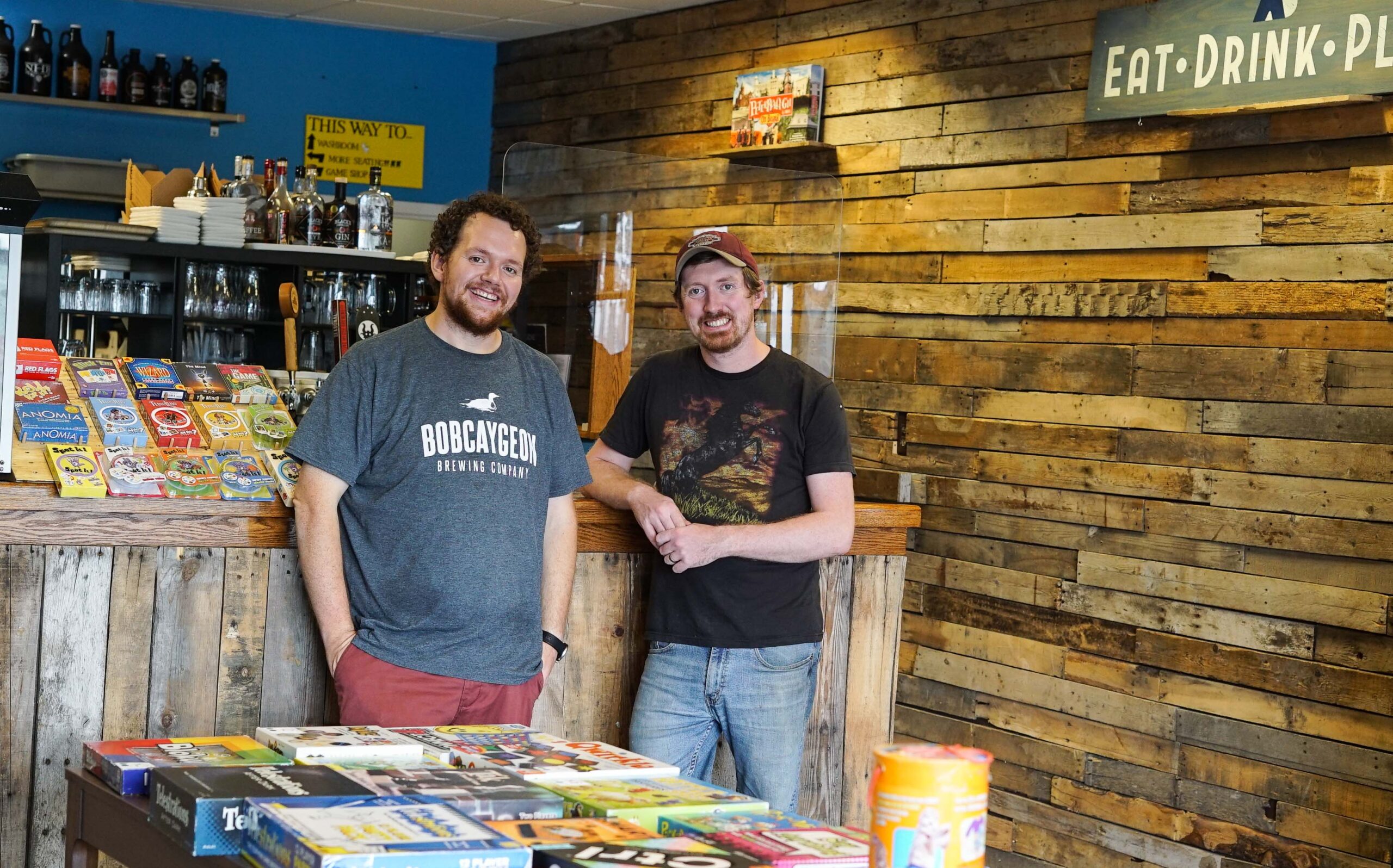 Two men in a board game lounge