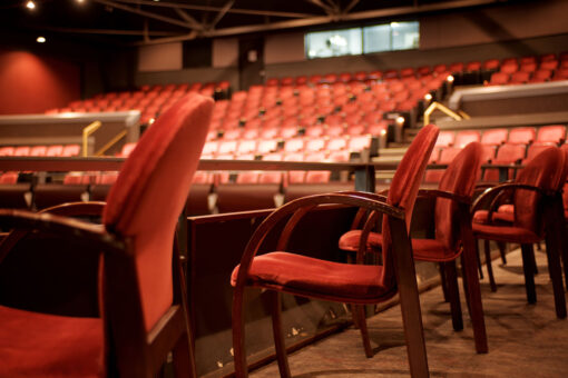 Red chairs in a theatre
