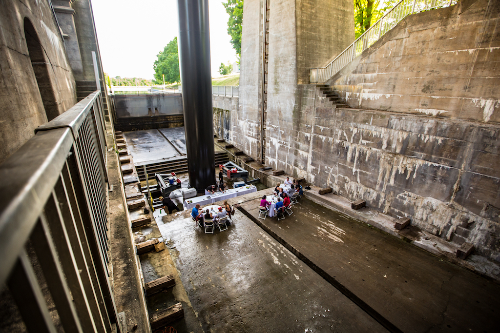 image with viewpoint from underneath the Peterborough Liftlock with Dining tables set up for event