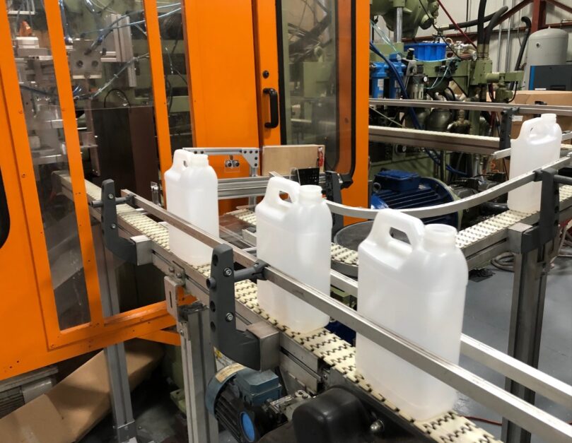 Empty plastic bottles on a production line at Merit